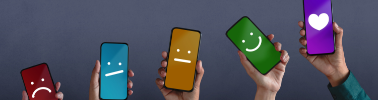 phones with cartoon faces showing reviews